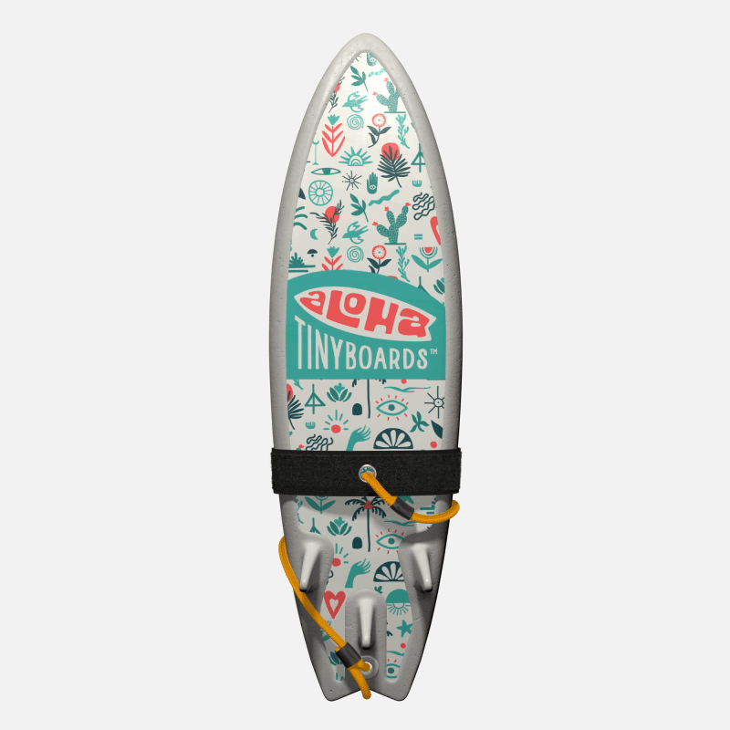 Animated GIF of Aloha Tinyboards foam finger surfboard rotating 360° showing the Boho Plants teal-and-coral botanical pattern.