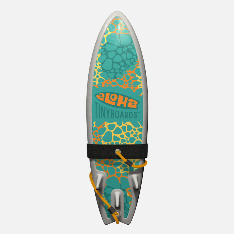 Animated GIF of Aloha Tinyboards foam finger surfboard rotating 360° showing Stones turquoise-and-coral pebble pattern on yellow.
