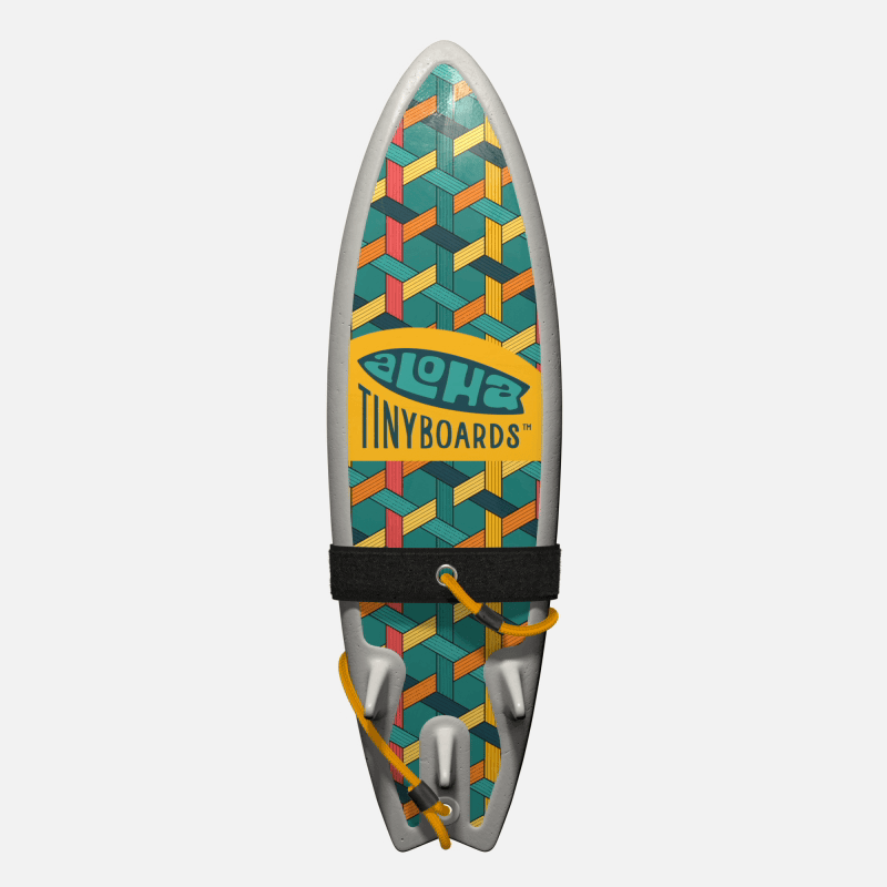 Animated GIF of Aloha Tinyboards foam finger surfboard rotating 360° showing Weave interlocking coral, yellow and teal lattice pattern.