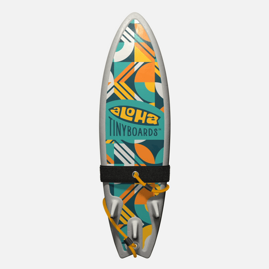 Animated GIF of Aloha Tinyboards foam finger surfboard rotating 360° showing Geometric orange, teal, and white shapes.