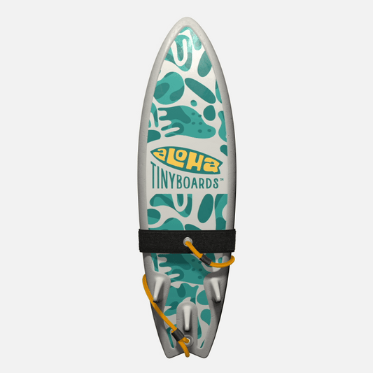 Animated GIF of Aloha Tinyboards foam finger surfboard rotating 360° showing Jellyfish abstract teal-and-white organic shapes.