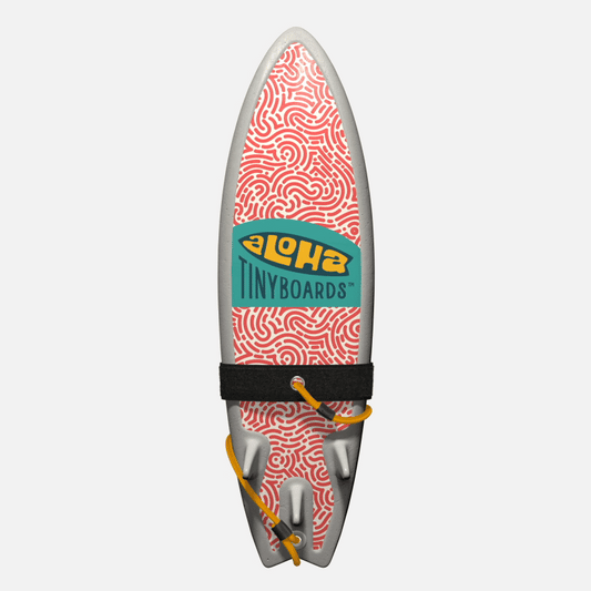 Animated GIF of Aloha Tinyboards foam finger surfboard rotating 360° showing Maze coral maze-like squiggle pattern on white.