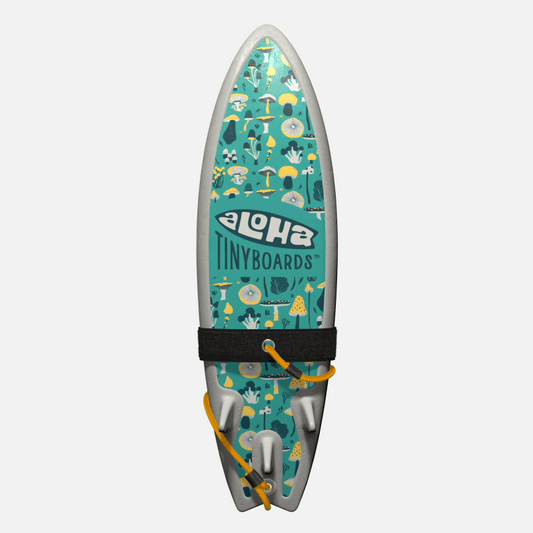 Animated GIF of Aloha Tinyboards foam finger surfboard rotating 360° showing Mushrooms assorted mushroom illustrations on teal.