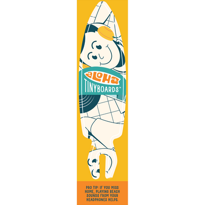 Aloha Tinyboard music sticker decal with white and teal cartoon surfer wearing yellow headphones on yellow, created by a local surfer featuring a Story from the Lineup: Pro Tip: If you miss home, playing beach sounds from your headphones helps.
