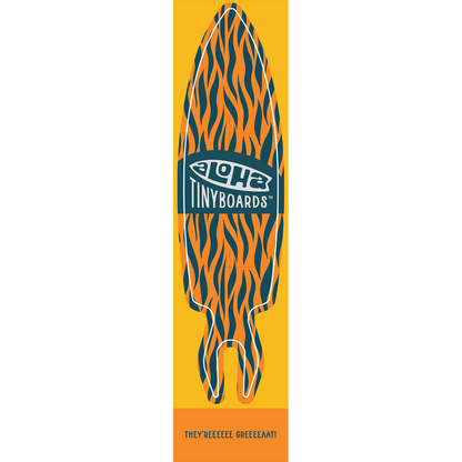 Aloha Tinyboard tiger sticker decal with orange and dark blue tiger stripe pattern on yellow, created by a local surfer featuring a Story from the Lineup: They’reeeeee Greeeeaat!